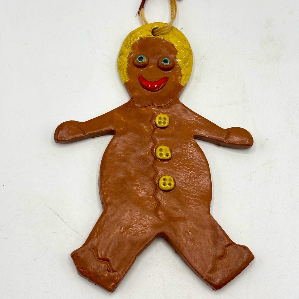 VTG handcrafted ceramic gingerbread boy ornament decor. 7" t x 5" w brown blond